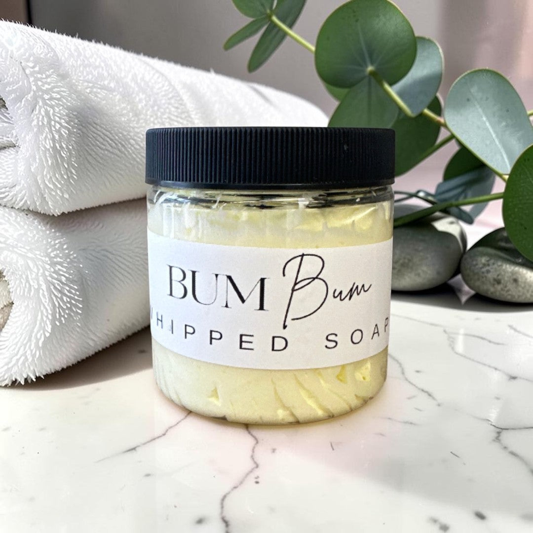 Doodlations Coffee Bar & Boutique Bum Bum Whipped Soap in a 4oz jar with a black lid and tropical scent.