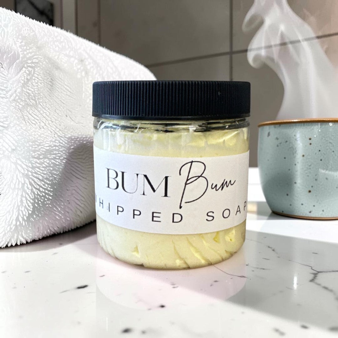 Doodlations Coffee Bar & Boutique Bum Bum Whipped Soap in a 4oz jar with a black lid and tropical scent.