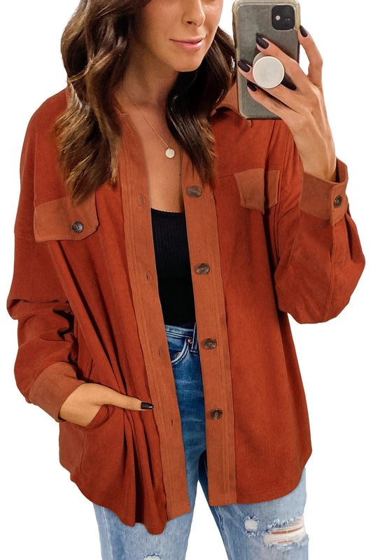 Doodlations Coffee Bar & Boutique burnt orange velvet shacket with button-down front and flap pockets on a woman.