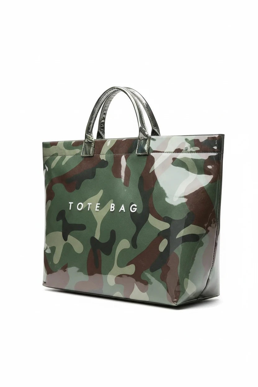 Doodlations Coffee Bar & Boutique glossy camouflage tote bag with white text, featuring sturdy handles.