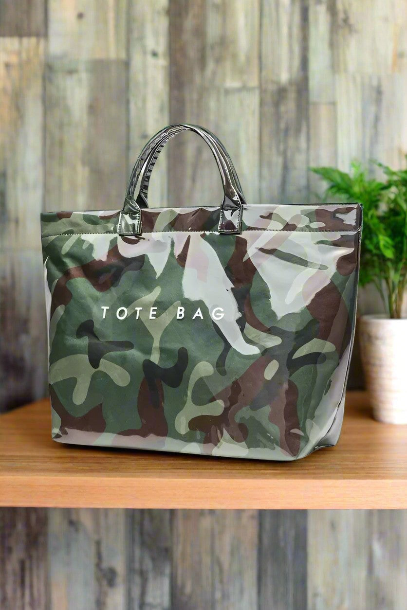 Doodlations Coffee Bar & Boutique glossy green camouflage tote bag with sturdy handles and white text on front.