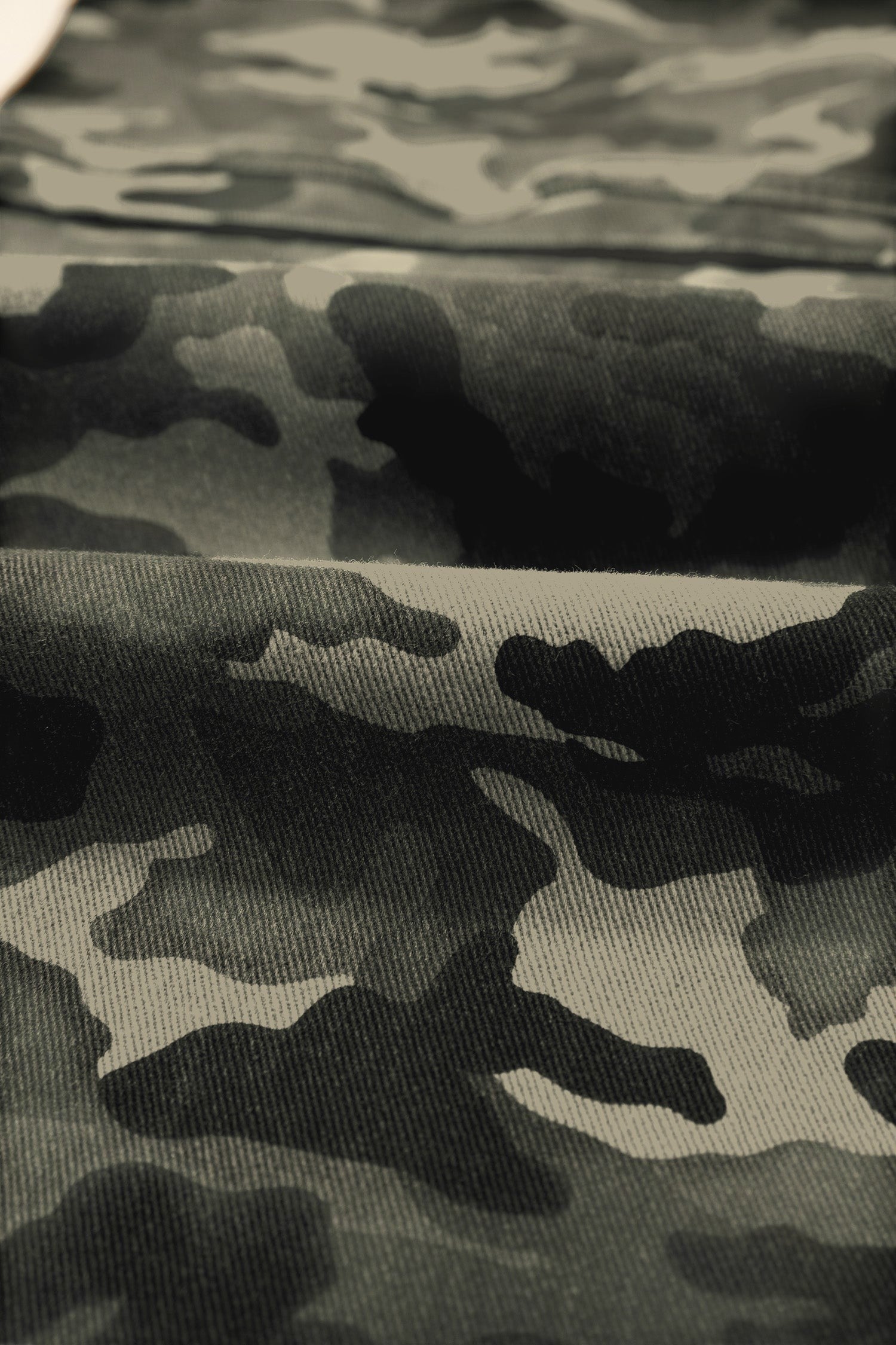Doodlations Coffee Bar & Boutique camouflage print fabric close-up of durable utility cargo pants
