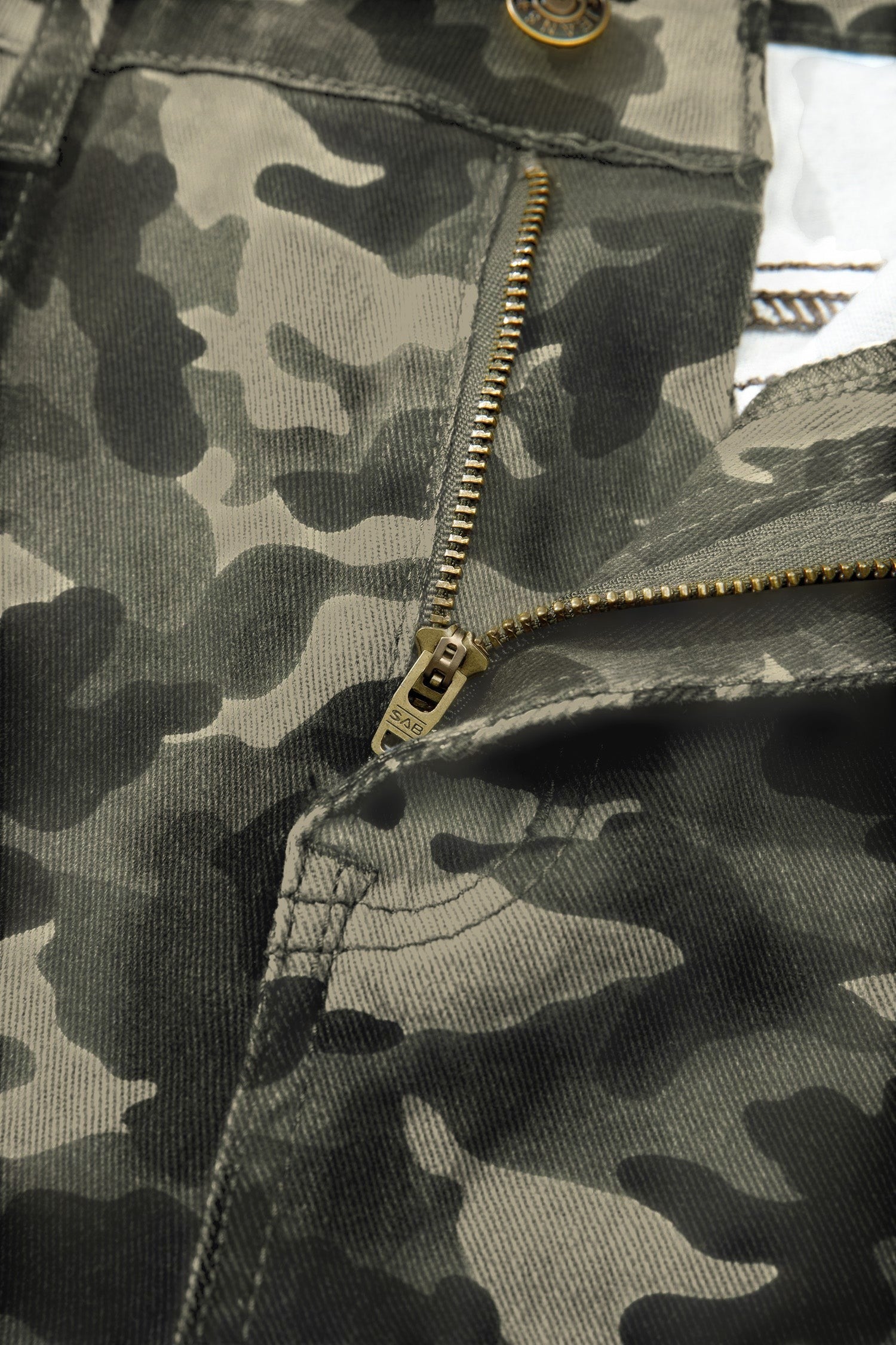 Doodlations Coffee Bar & Boutique camouflage cargo pants featuring a metal zipper and durable fabric construction.