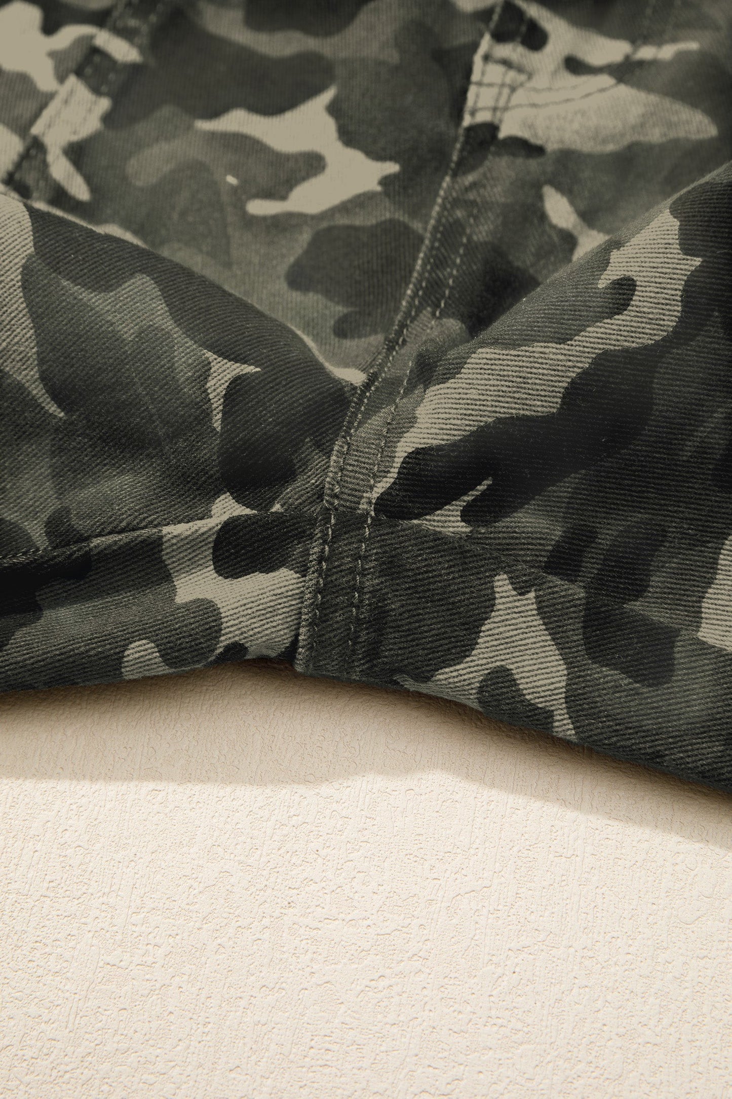 Doodlations Coffee Bar & Boutique camouflage cargo pants featuring durable fabric and reinforced stitching detail