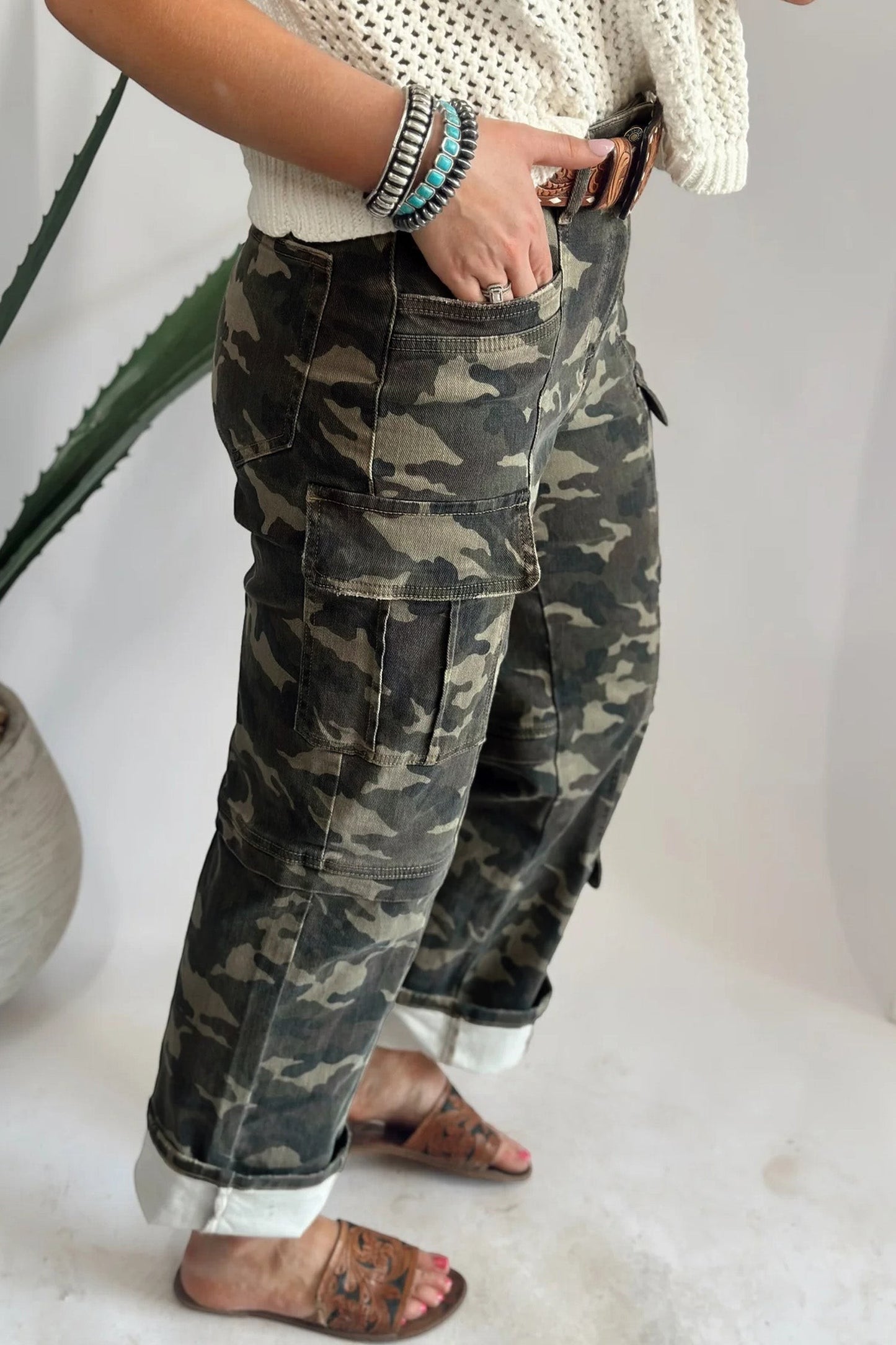 Doodlations Coffee Bar & Boutique women's camouflage cargo pants with utility pockets and cuffed hems worn with sandals