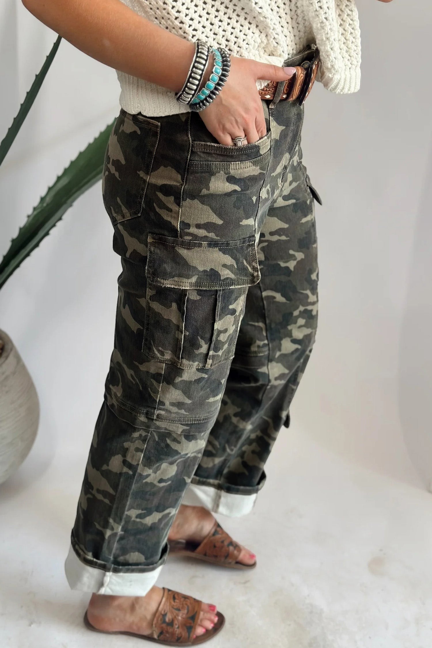 Doodlations Coffee Bar & Boutique women's camouflage cargo pants with utility pockets and cuffed hems worn with sandals