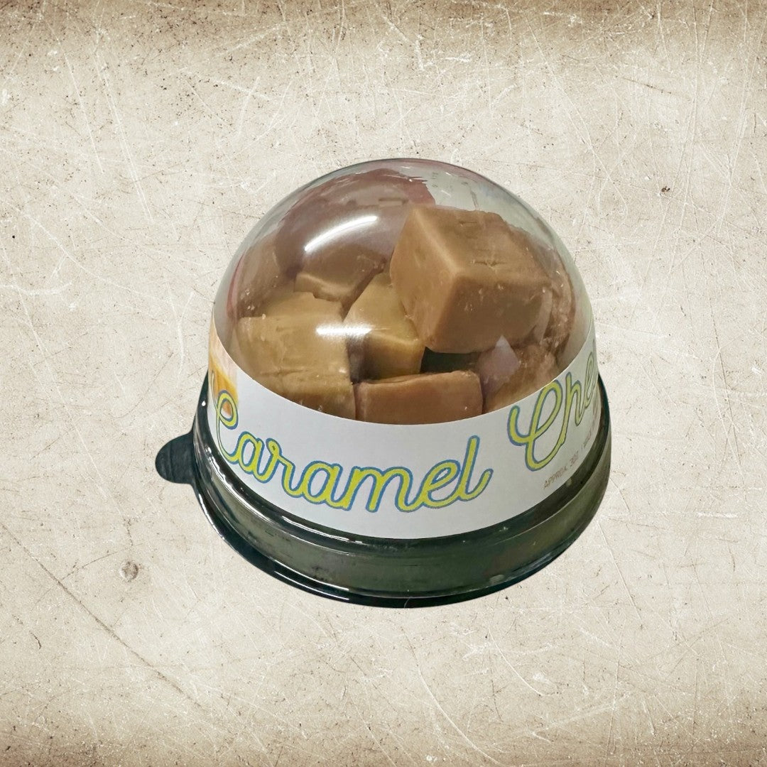 Doodlations Coffee Bar & Boutique Caramel Chew wax melts in a clear plastic container with a white label.