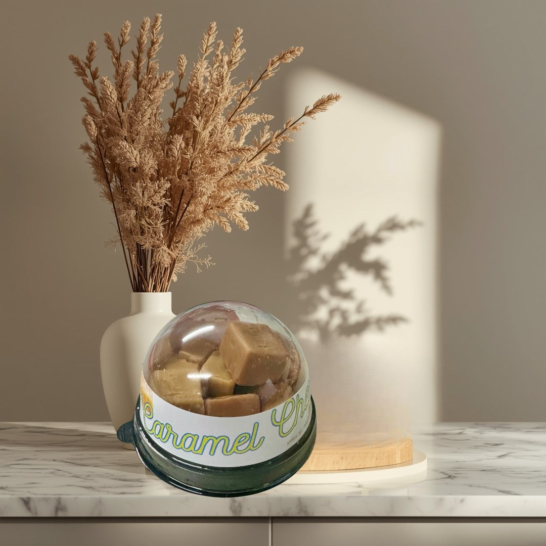Doodlations Coffee Bar & Boutique Caramel Chew wax melts in a clear plastic container with a white label.