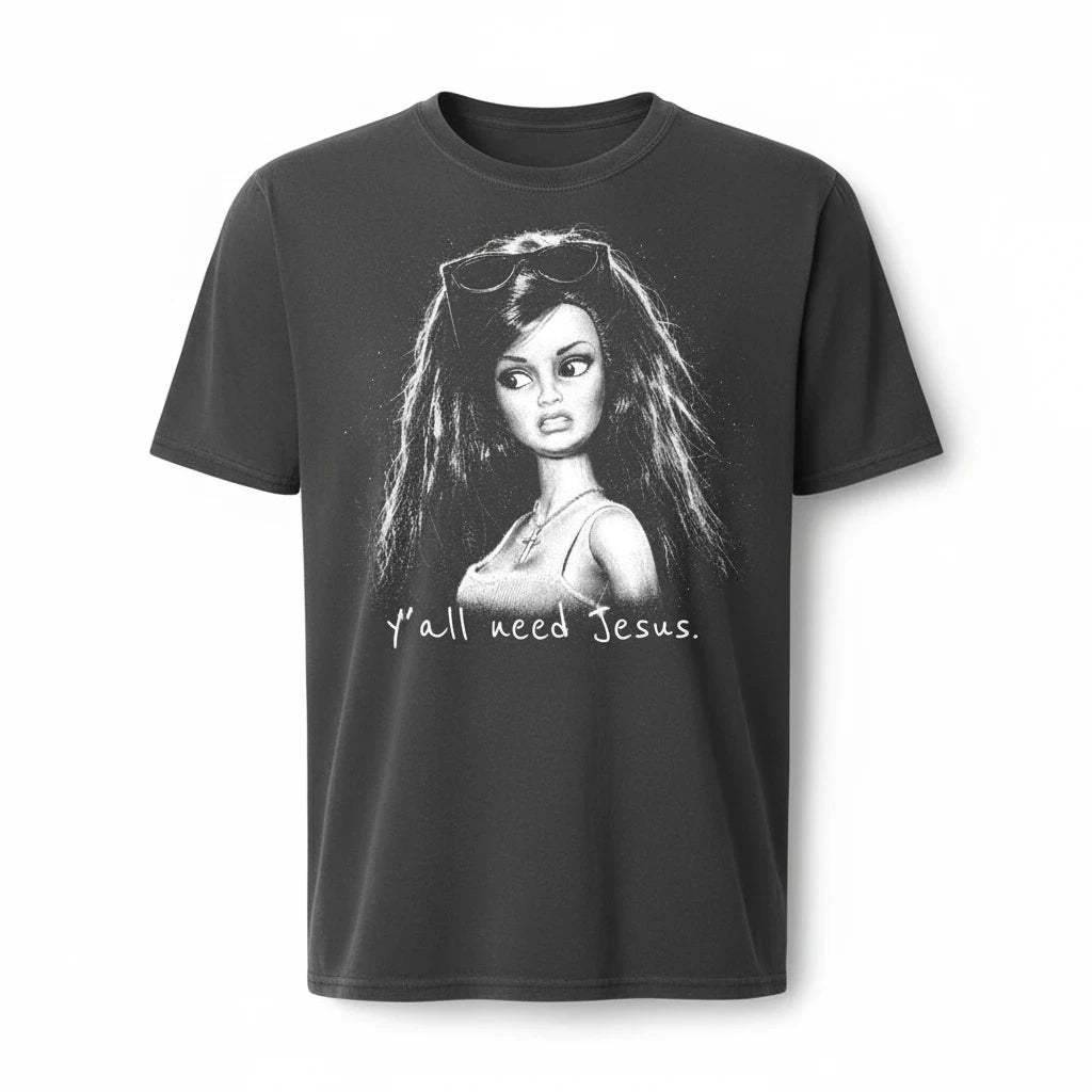 Doodlations Coffee Bar & Boutique charcoal grey cotton t-shirt with a white graphic of a doll and Y'all Need Jesus text