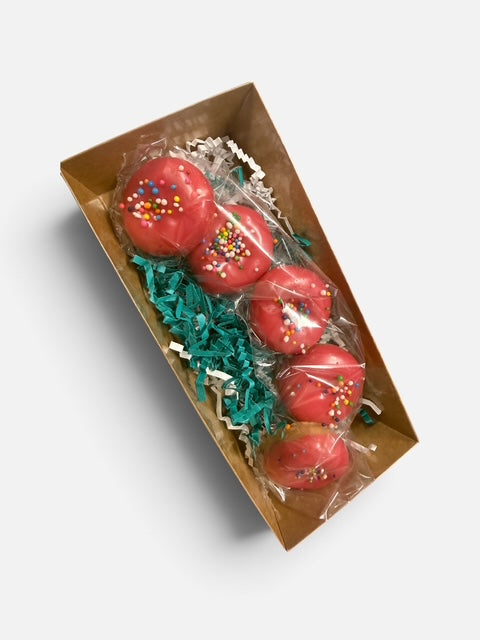 Doodlations Coffee Bar & Boutique cherry glazed doughnut wax melts with colorful sprinkles in a kraft gift box