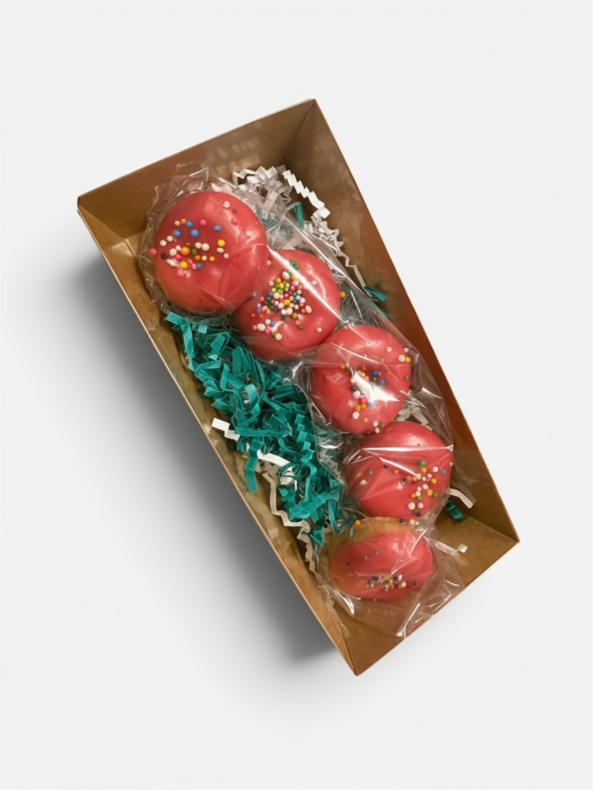 Doodlations Coffee Bar & Boutique cherry glazed doughnut wax melts with colorful sprinkles in a brown gift box