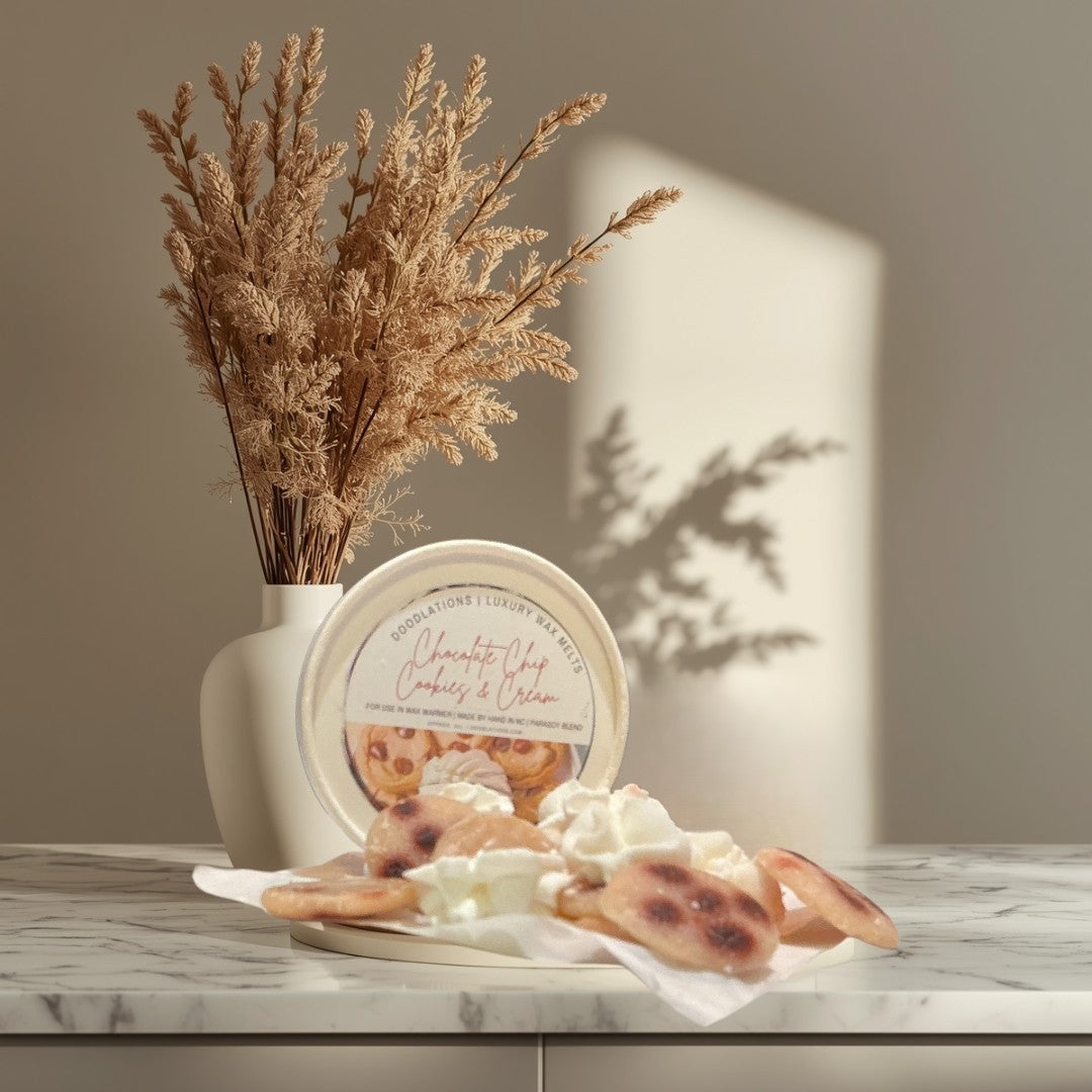 Doodlations Coffee Bar & Boutique Chocolate Chip Cookies & Cream wax melts in a round container, featuring realistic cookie and cream swirl designs.