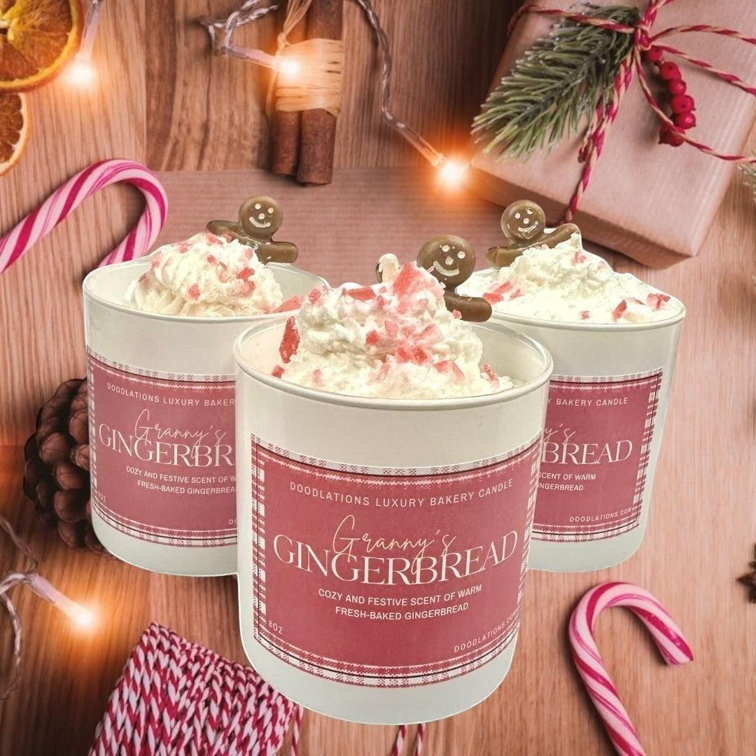 Doodlations Coffee Bar & Boutique Christmas Gingerbread luxury candle with whipped topping and gingerbread man accent.