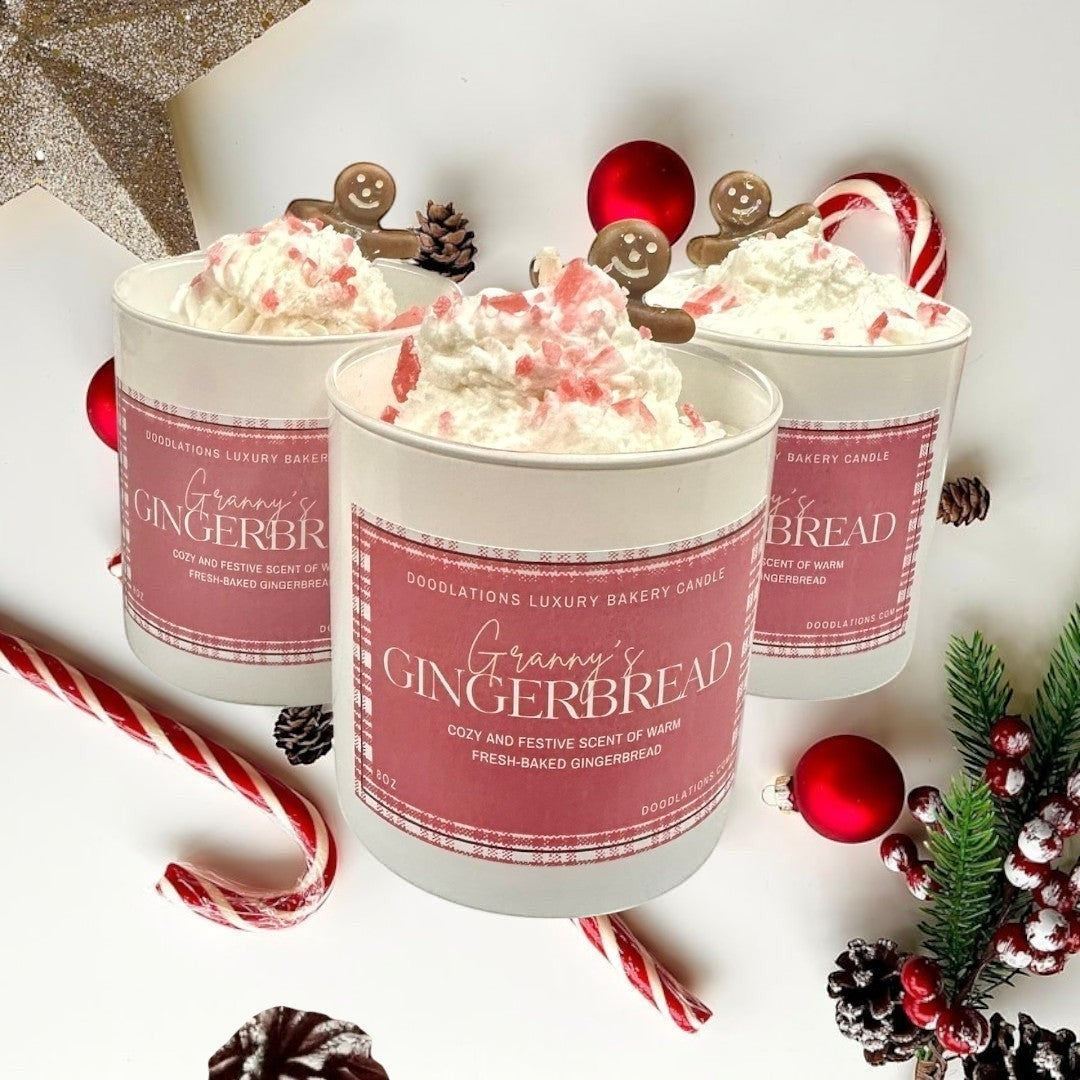 Doodlations Coffee Bar & Boutique Christmas Gingerbread luxury candle with whipped topping and gingerbread man accent.