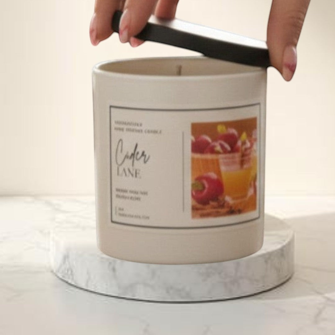 Doodlations Coffee Bar & Boutique Cider Lane luxury boutique candle with warm apple cider scent.