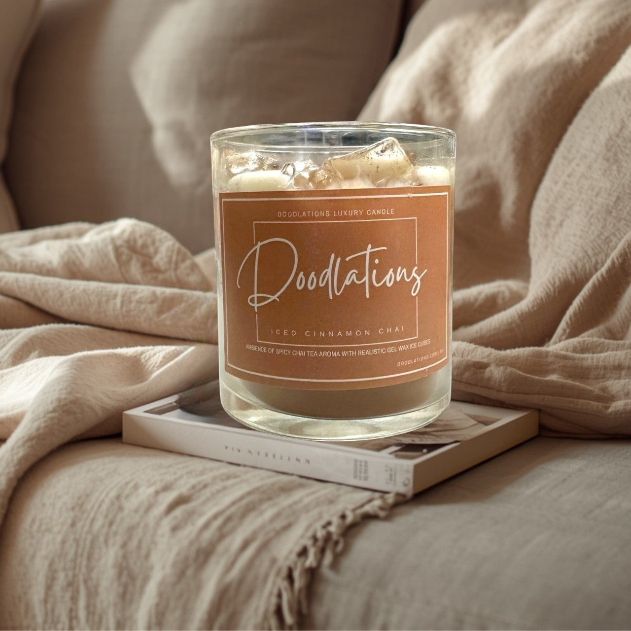 Doodlations Coffee Bar & Boutique Cinnamon Chai Latte luxury candle with realistic wax ice cubes and a warm, spicy scent.