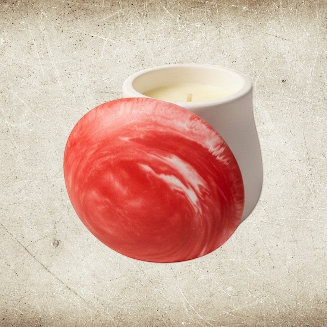 Doodlations Coffee Bar & Boutique white concrete candle in mushroom vessel with red and white marbled lid, soy wax.