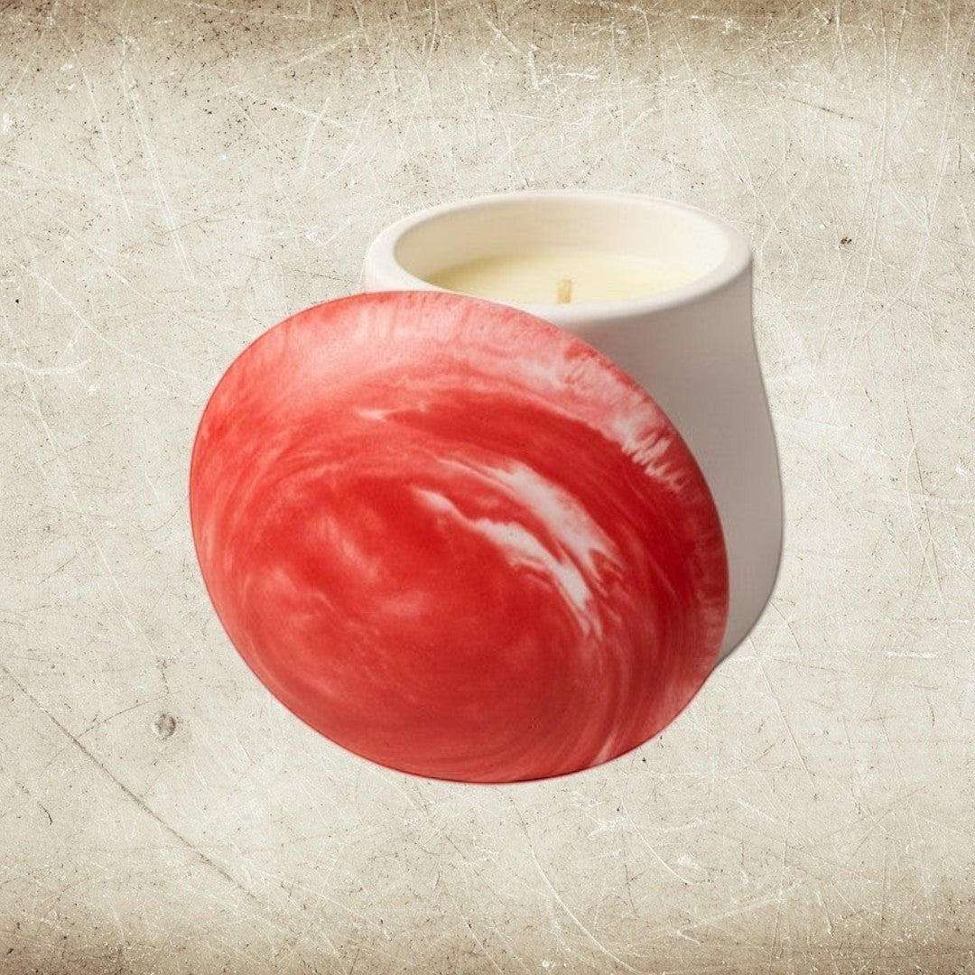 Doodlations Coffee Bar & Boutique white concrete candle in mushroom vessel with red and white marbled lid, soy wax.