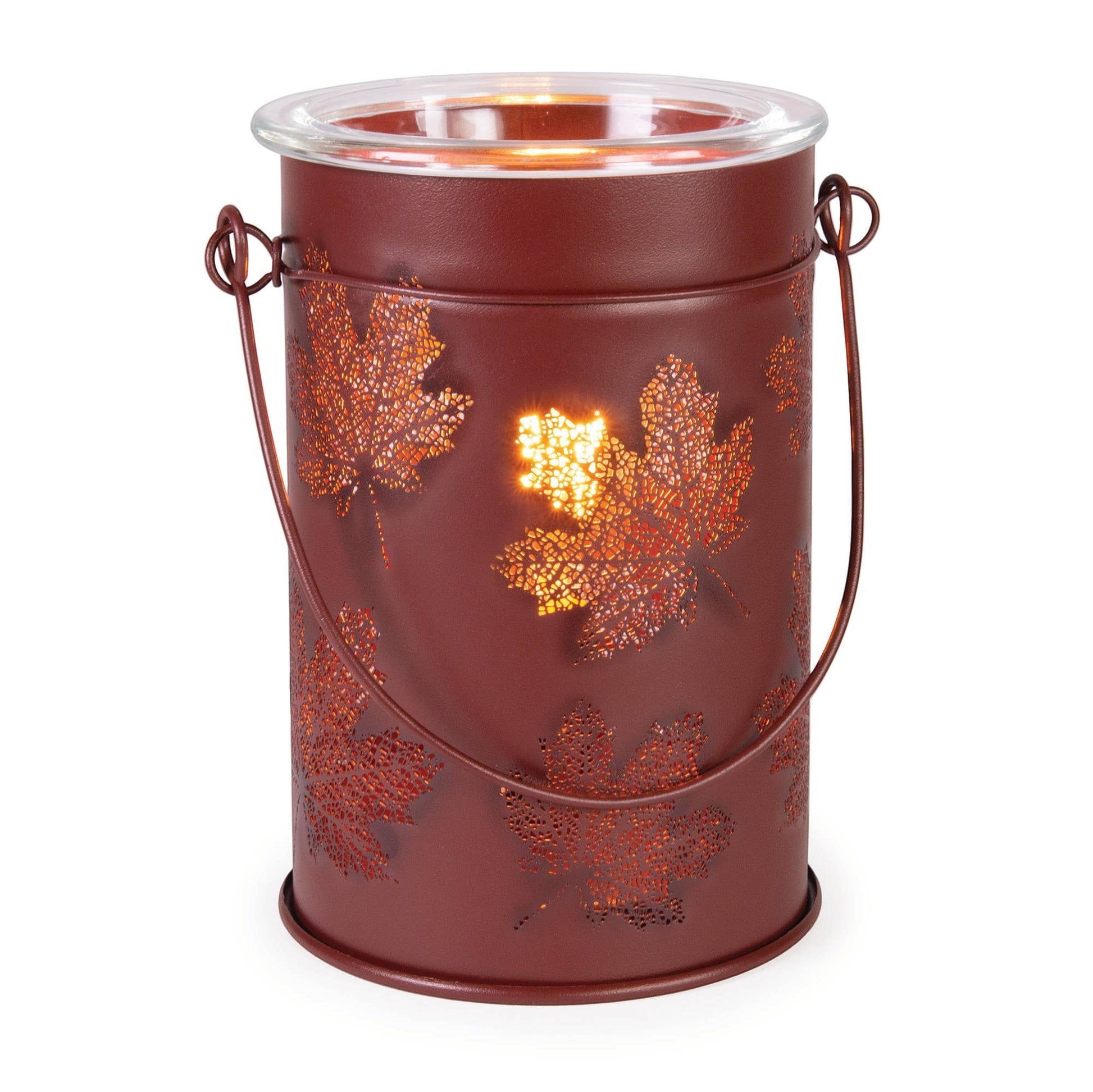 Doodlations Coffee Bar & Boutique antique-brushed copper wax warmer with cut-out fall leaf patterns and glass dish