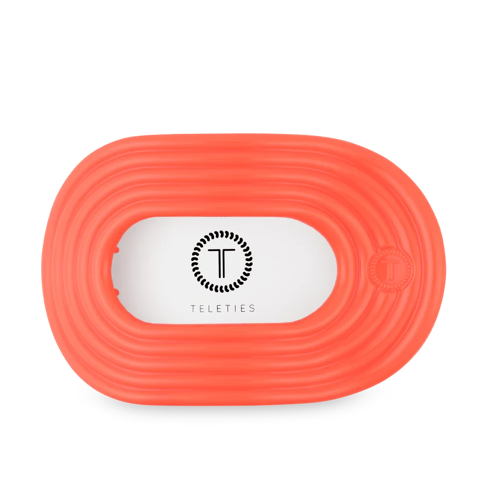 Doodlations Coffee Bar & Boutique Teleties Darty coral flat round hair clip with ribbed texture.