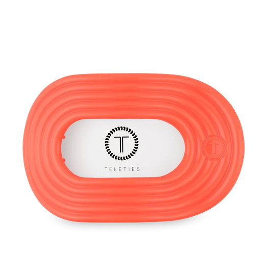 Doodlations Coffee Bar & Boutique Teleties Darty coral flat round hair clip with ribbed texture.