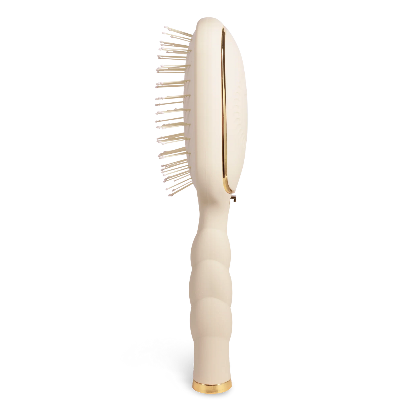 Doodlations Coffee Bar & Boutique cream detangler brush for fine hair with ergonomic coil handle and gold accents