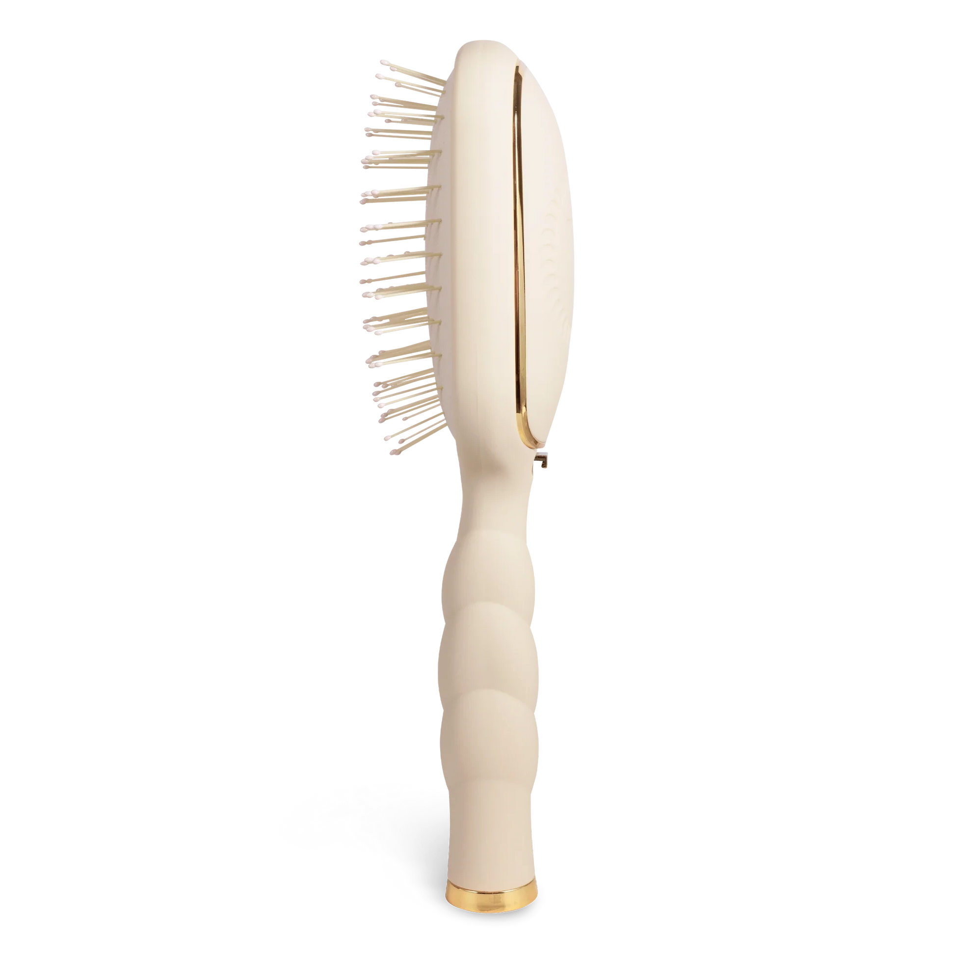 Doodlations Coffee Bar & Boutique cream detangler brush for fine hair with ergonomic coil handle and gold accents