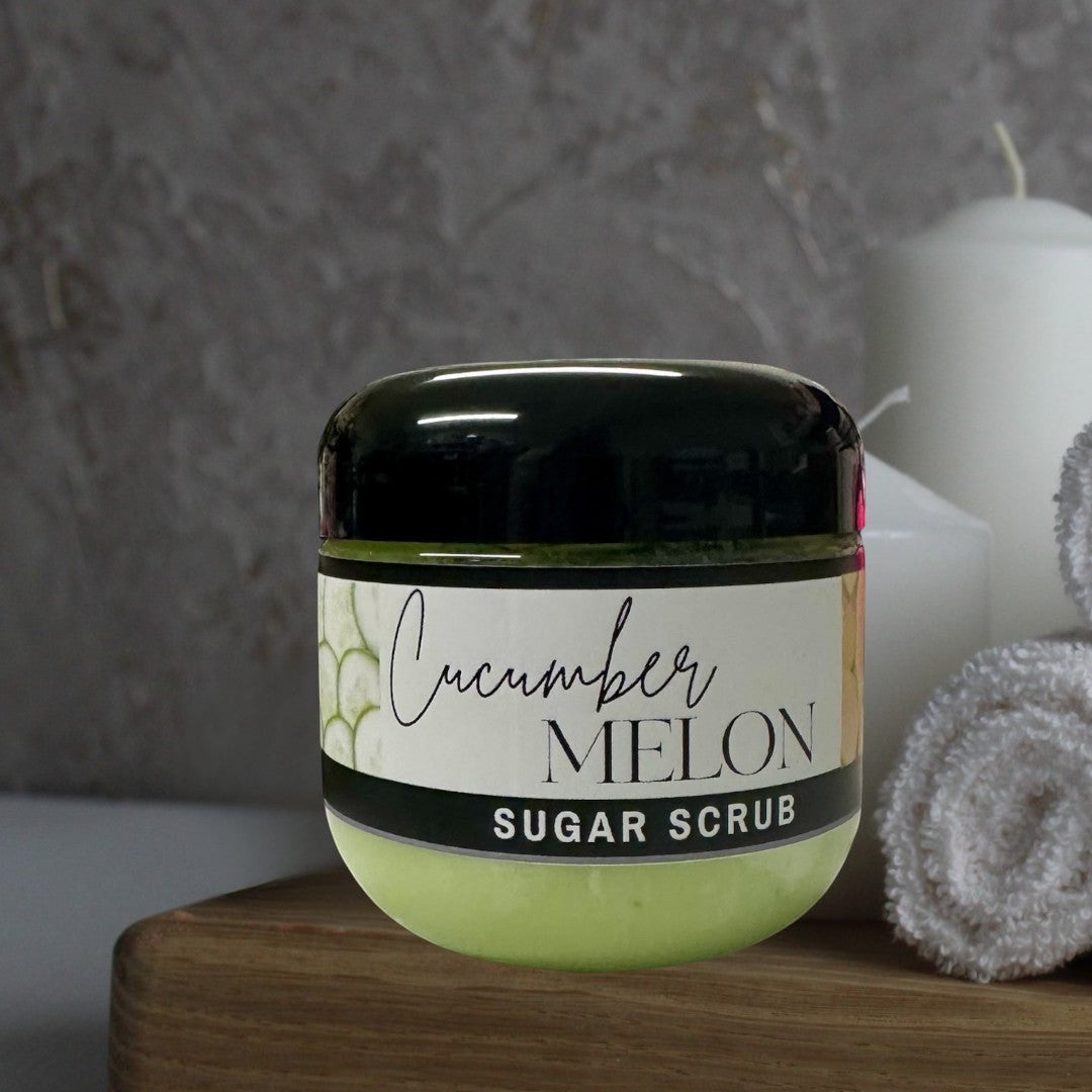 Doodlations Coffee Bar & Boutique Cucumber Melon Sugar Scrub, 4 oz jar, light green exfoliating body scrub.