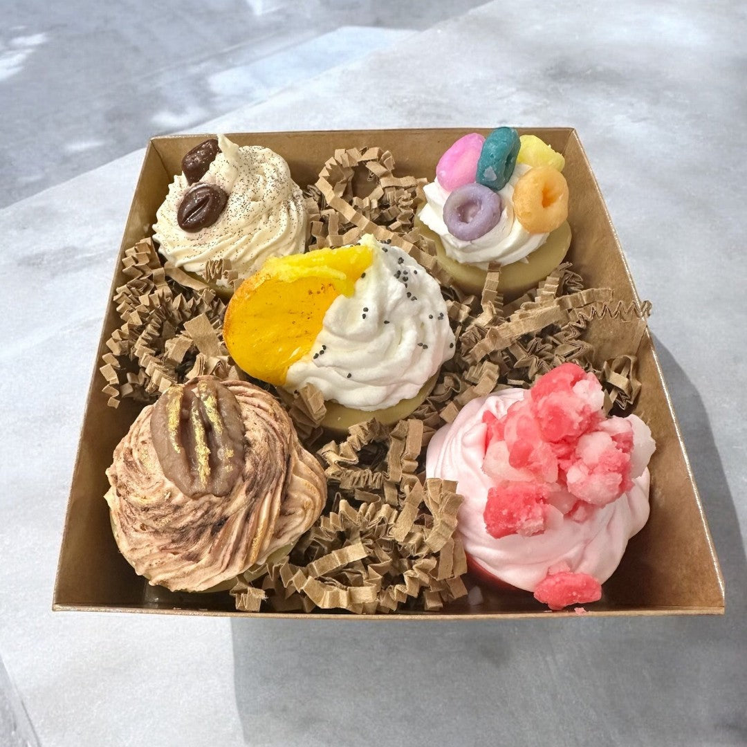 Doodlations Coffee Bar & Boutique assorted mini cupcake wax melts in five scents: coffee bean, fruit loops, orange slice, maple pecan, and strawberry.