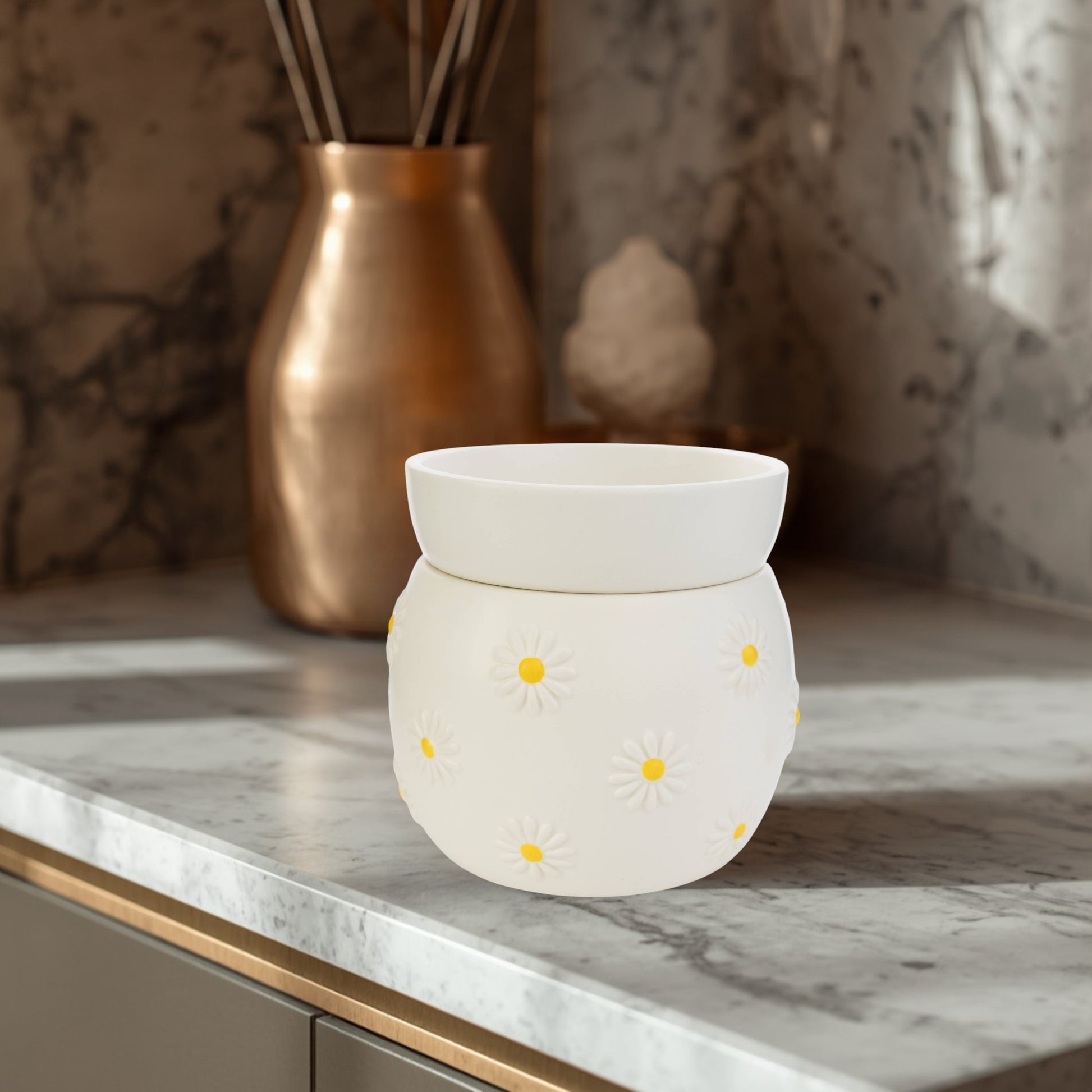 Doodlations Coffee Bar & Boutique Daisy Delight ceramic wax warmer with raised white daisies and yellow centers.