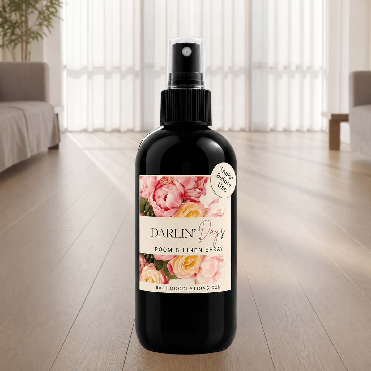Doodlations Coffee Bar & Boutique Darlin’ Days room and linen spray in a black bottle with a floral label.