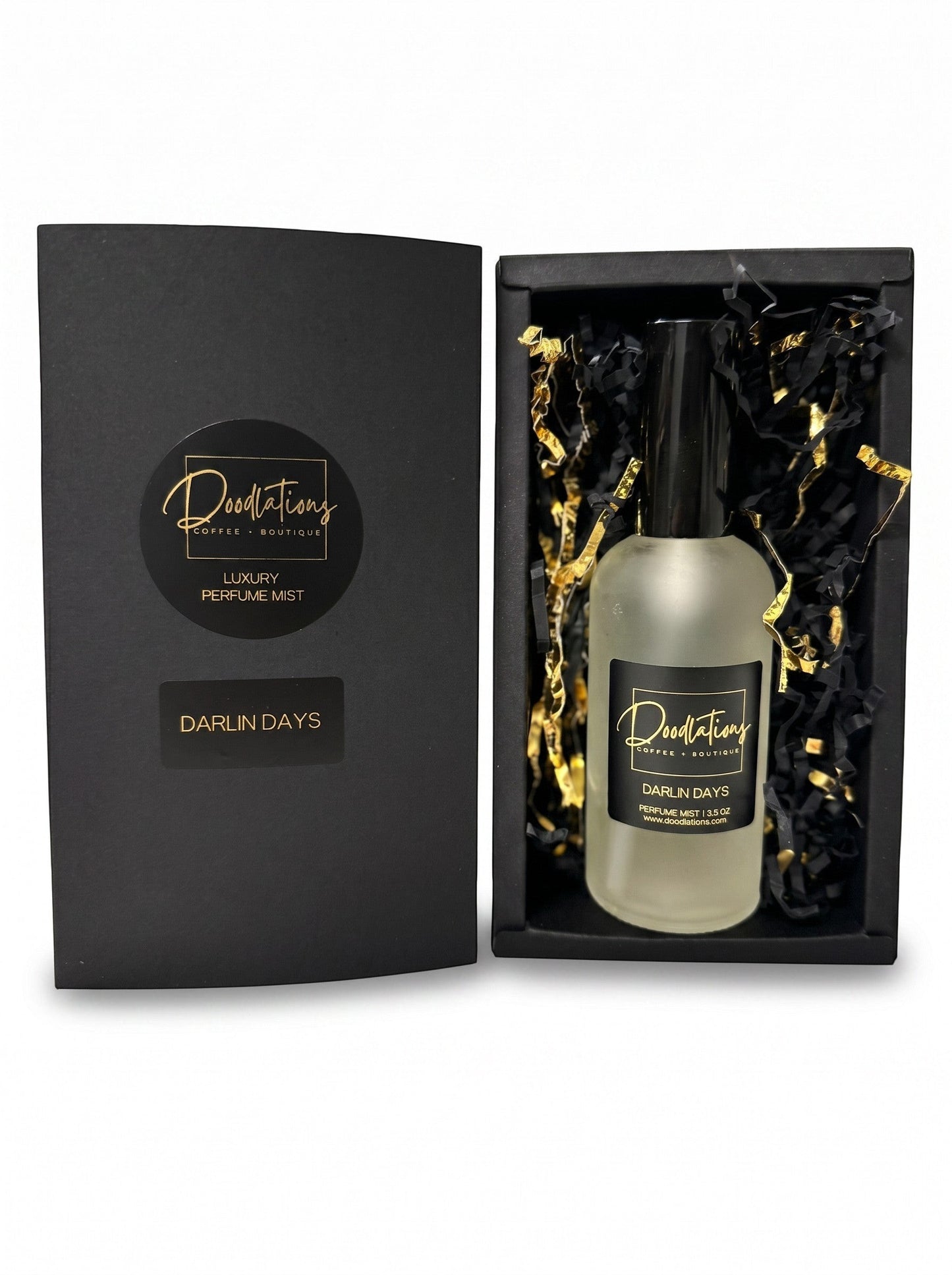 Doodlations Coffee Bar & Boutique Darlin Days luxury fine mist perfume in a glass bottle inside a black gift box.