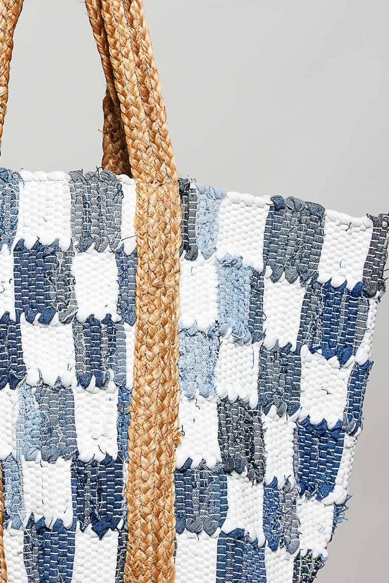 Doodlations Coffee Bar & Boutique ivory and blue denim checkerboard woven tote bag with braided straw handles