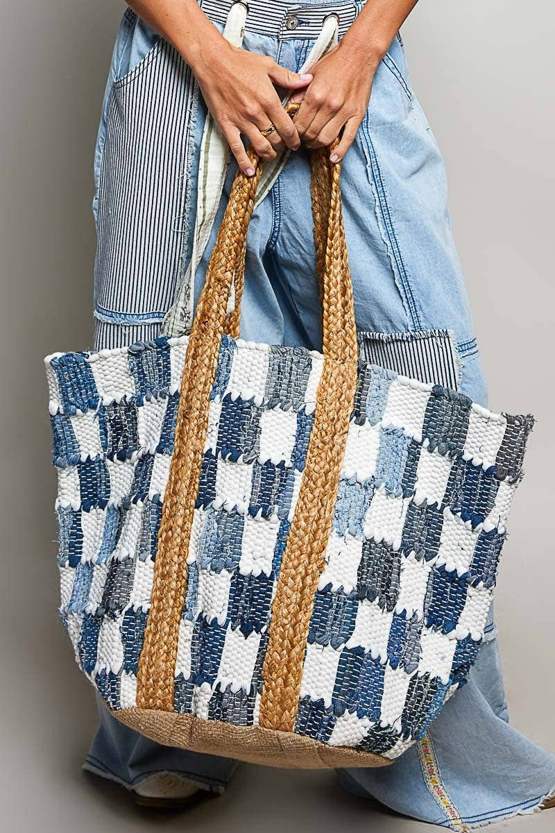 Doodlations Coffee Bar & Boutique ivory and blue denim checkerboard woven tote bag with braided straw handles