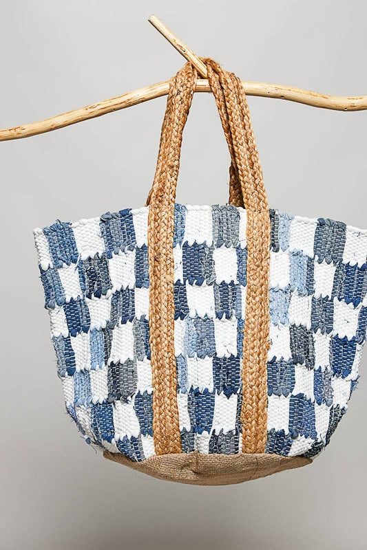 Doodlations Coffee Bar & Boutique handwoven denim checkerboard tote bag with braided straw handles and jute base.