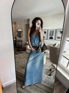Doodlations Coffee Bar & Boutique vintage washed blue denim vest paired with a matching long denim skirt in a mirror
