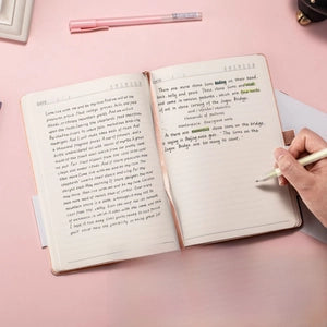 Doodlations Coffee Bar & Boutique A6 hardcover dotted journal with lay-flat binding and hand writing on white paper