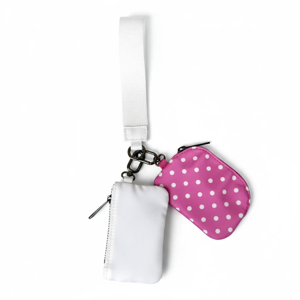 Doodlations Coffee Bar & Boutique Lulu Mac double pouch wristlet in hot pink with white polka dots and solid white