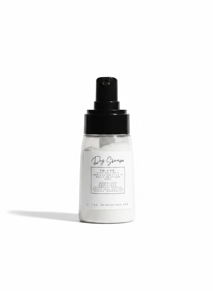 Doodlations Coffee Bar & Boutique dry powder shampoo bottle with a black pump dispenser on a white background.