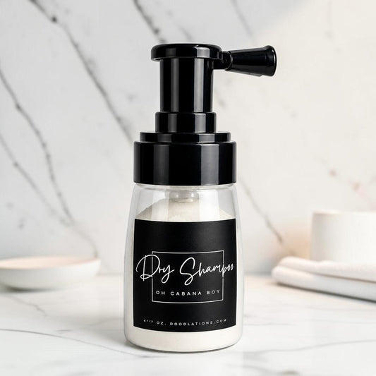 Doodlations Coffee Bar & Boutique Oh Cabana Boy dry powder shampoo in a clear bottle with a black pump dispenser.
