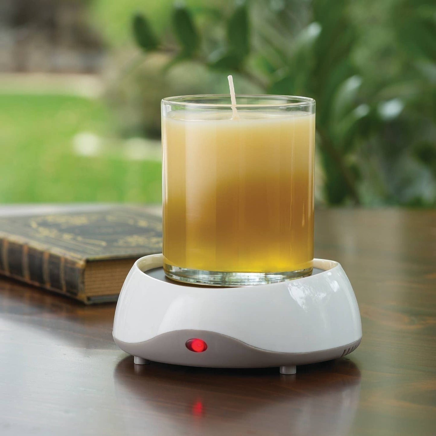 Doodlations Coffee Bar & Boutique electric candle warmer plate with a glass candle melting wax. White and gray design.