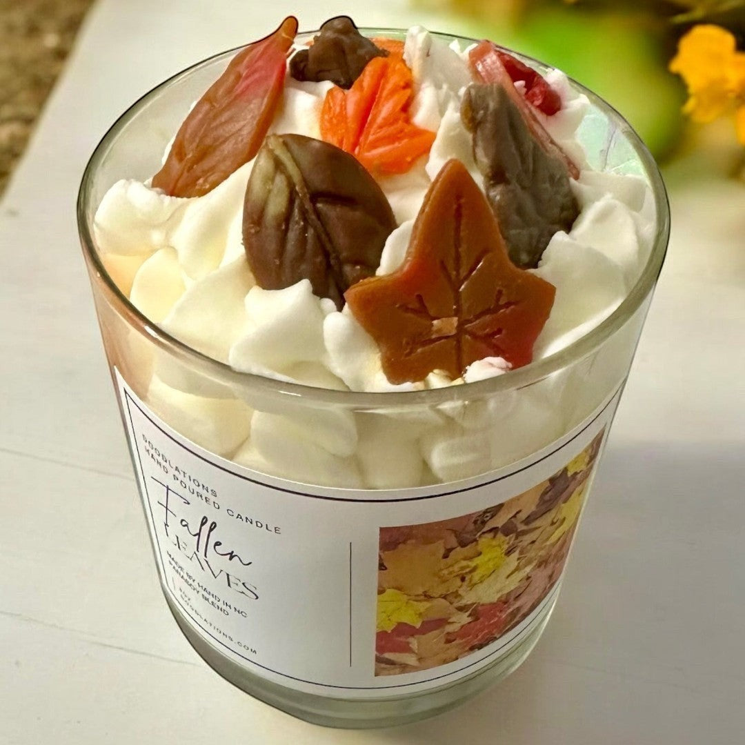 Doodlations Coffee Bar & Boutique Fallen Leaves luxury candle with realistic wax leaves and creamy white wax.
