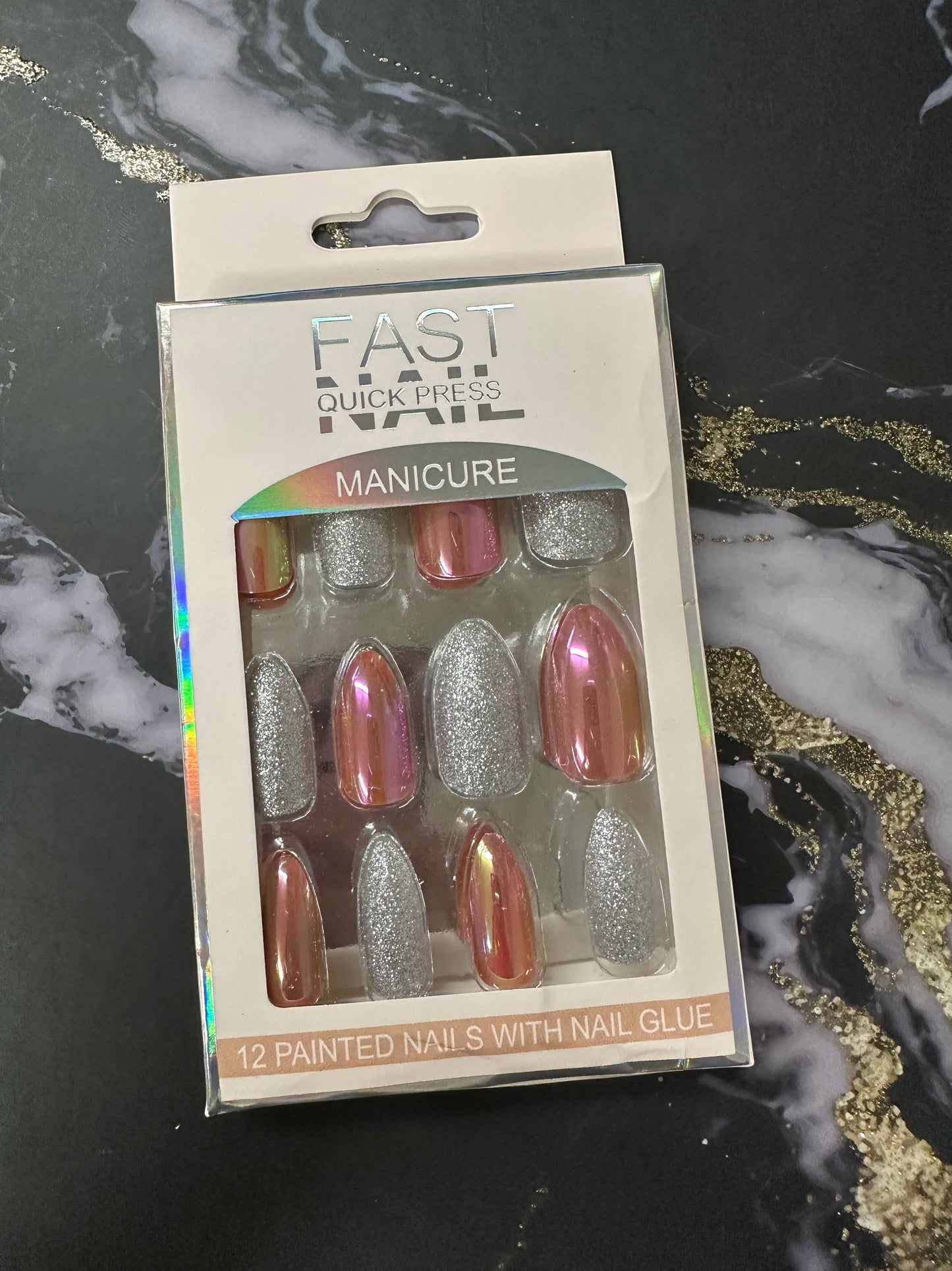 Doodlations Coffee Bar & Boutique Fast Nails Quick Press Manicure set with 12 chrome and glitter finish press-on nails.