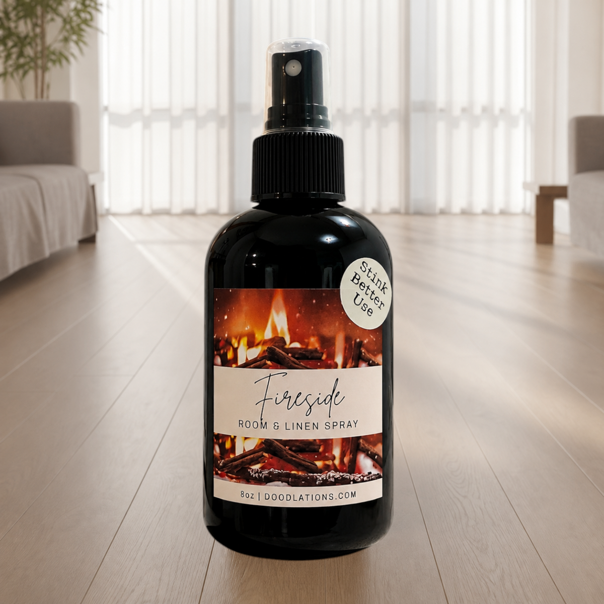 Doodlations Coffee Bar & Boutique Fireside room and linen spray in a black bottle with a fireplace label.