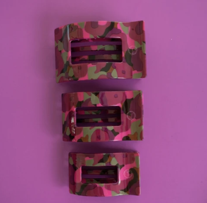 Doodlations Coffee Bar & Boutique Teleties rectangular hair clips in a multi-colored floral print on a purple background