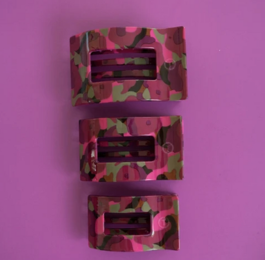 Doodlations Coffee Bar & Boutique Teleties rectangular hair clips in a multi-colored floral print on a purple background