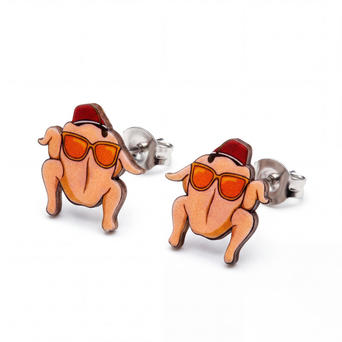 Doodlations Coffee Bar & Boutique Friends turkey earrings with sunglasses and a red hat, handmade plastic studs.