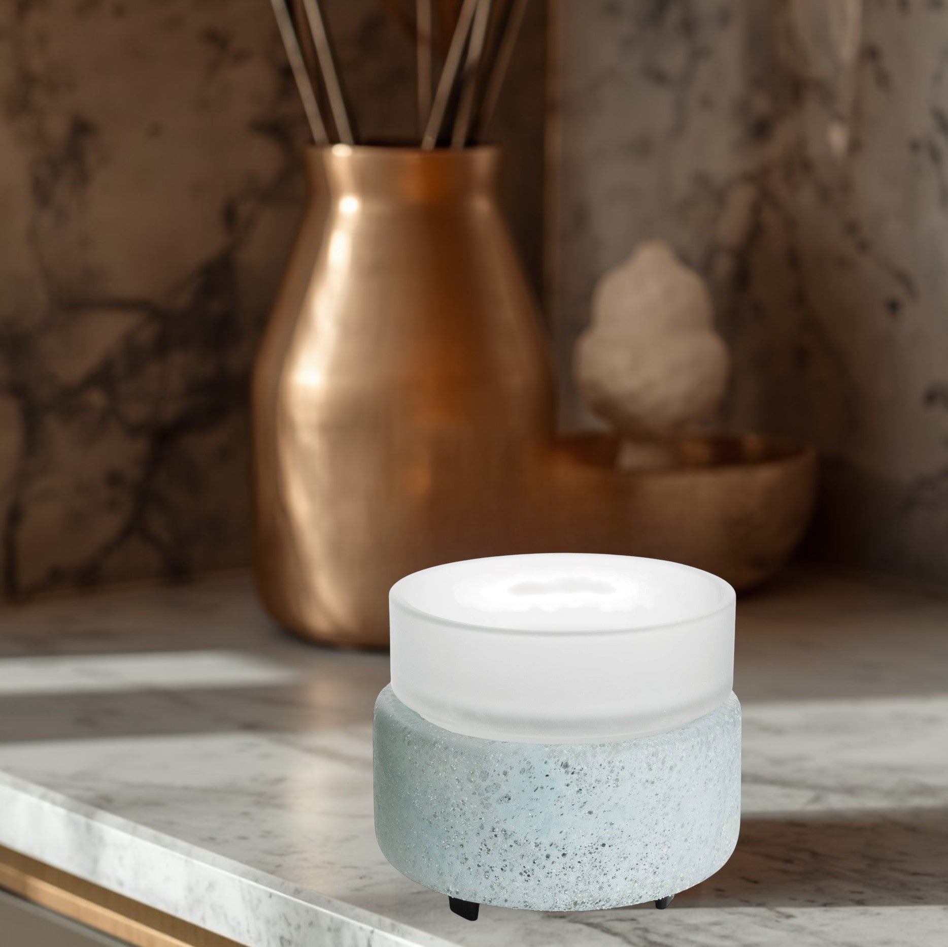 Doodlations Coffee Bar & Boutique frosted glass wax warmer with textured blue-green base and ambient glow.