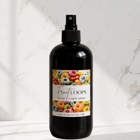 Doodlations Coffee Bar & Boutique Fruit Loop room and linen spray in a black bottle with a colorful cereal label.
