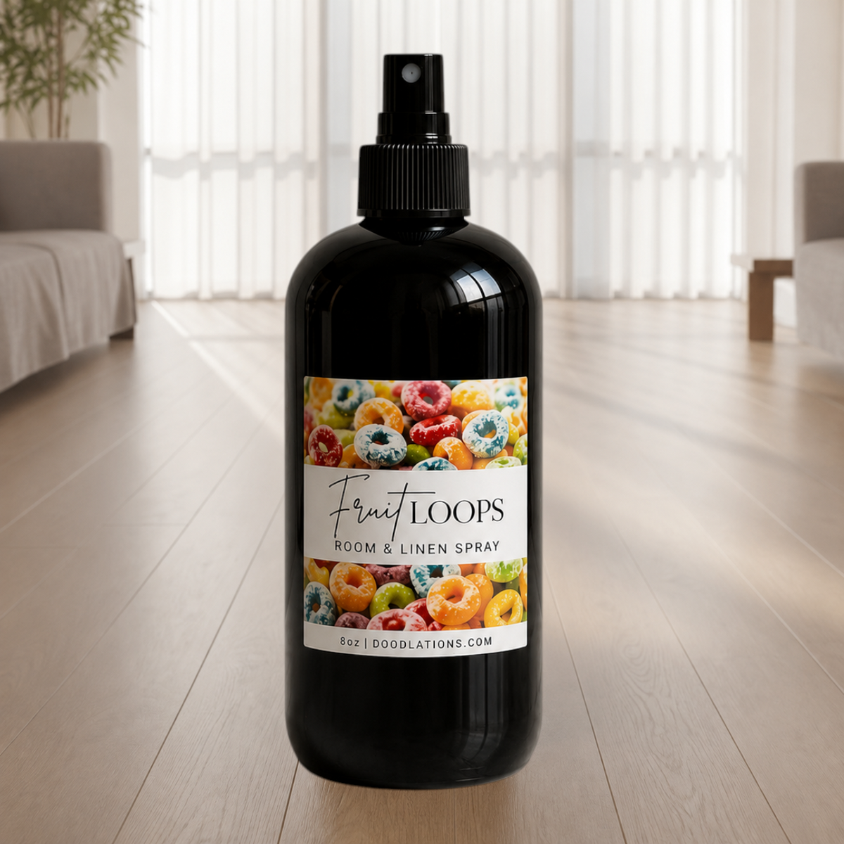 Doodlations Coffee Bar & Boutique Fruit Loops room and linen spray in a black bottle with a colorful cereal label.